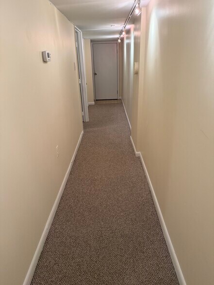 Hall to bedroom, bath and utility room. New carpeting throughout apt. - 1336 Kenyon St NW