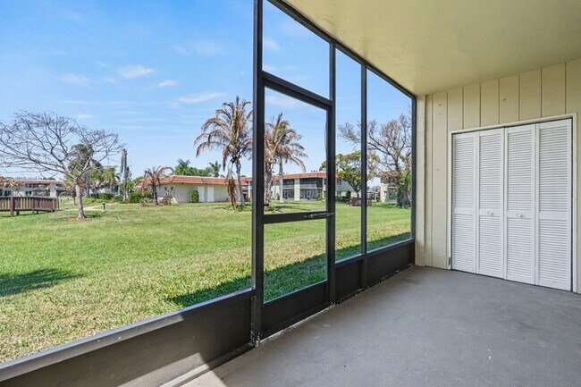 Building Photo - Must see 1st floor, end unit with lots of natural light in St Lucie Gardens.