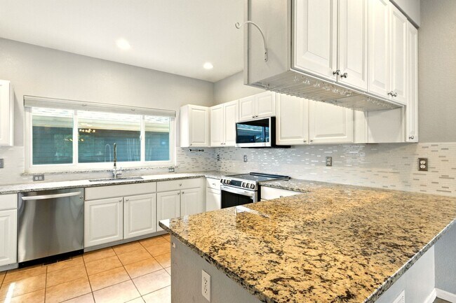 Building Photo - Charming Corner Lot! 3 Bedroom, 3.5 Bath w...