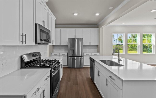 Building Photo - Be the 1st to live in this stunning, never...