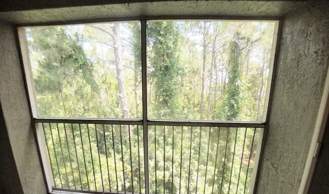 Building Photo - Gorgeous  Forest View, Wood Floors  1/1 condo for RENT @The Crest close to UCF.