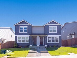 Building Photo - Brand-New 3BR Town Home Near JBLM | Bonus Loft, 2-Car Garage & Modern Finishes