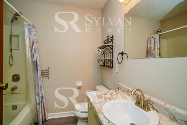 Building Photo - The living is easy in this 3 bedroom, 2.5 bathroom home