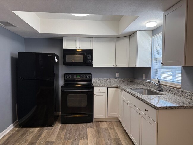 Building Photo - 65th Terrace N - Triplex