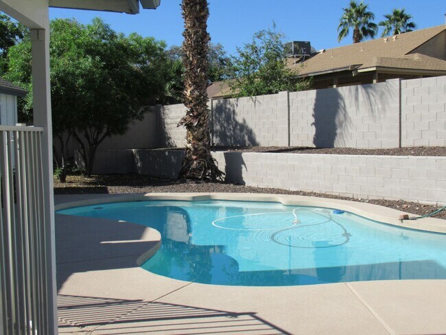 Building Photo - Nice 4 Bedroom + Den Home With Pool In AHW...