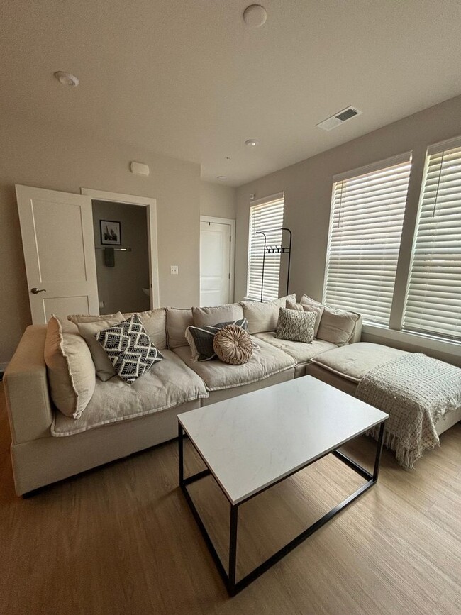 Building Photo - Modern 3BR Condo: Walk to Metro, 3 Miles f...