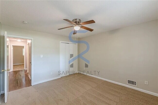 Building Photo - Move in before November 30th and choose your reward: a $250 Amazon Gift Card or a 55 Smart TV!