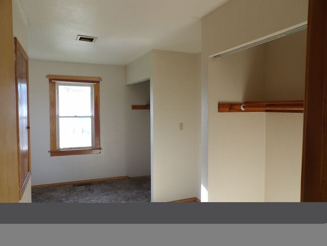 Building Photo - 2 Full Bedroom House with TWO BONUS rooms!