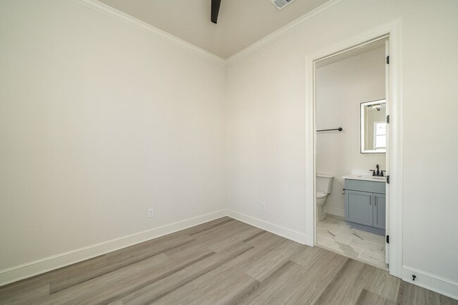 Building Photo - COMING SOON! 3 bedroom, 3.5 Bath, 2 Car Garage Townhome! Fully Furnished!