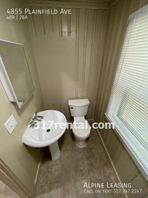 Building Photo - 4/2 with huge 2-car garage/workshop combo ...