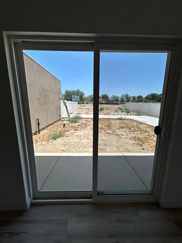 Building Photo - 9308 E Ave T 6