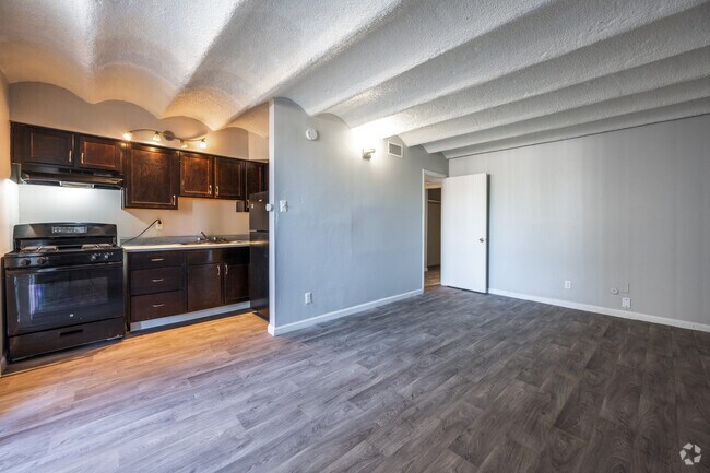 1BR, 1BA - 539SF - Living Room and Kitchen - Nova Peak Gated Community
