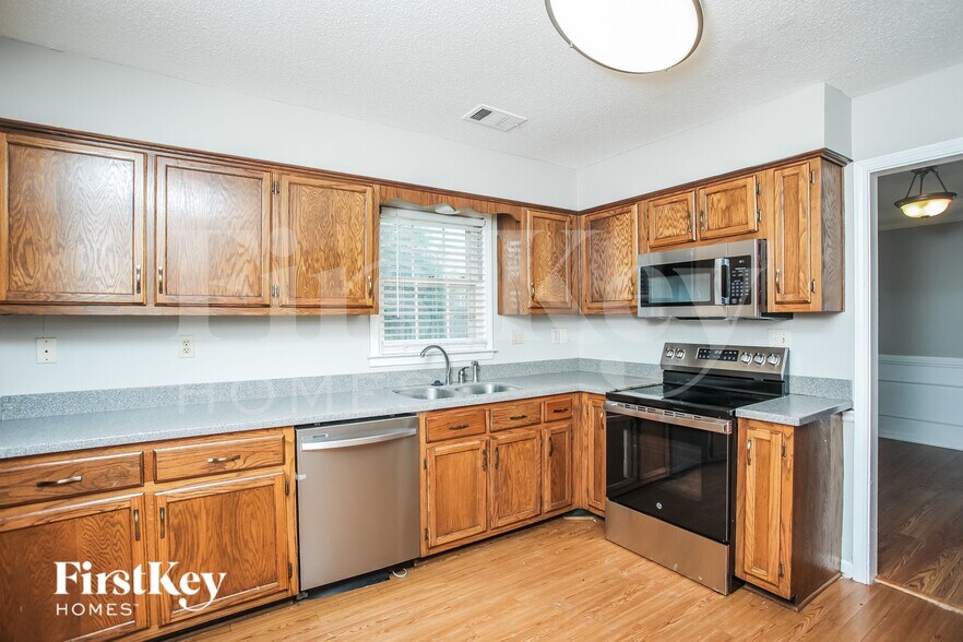 Building Photo - 8866 Quailwood Cove