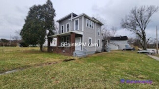 Building Photo - 9804 Miles Ave