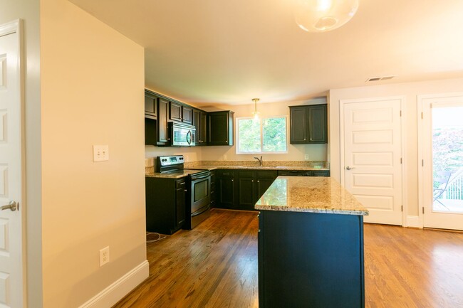 Building Photo - **Application pending 5/1/2026**Stunning Carrboro Condo available early June!