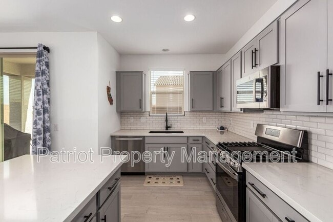 Building Photo - 14377 W Alameda Dr
