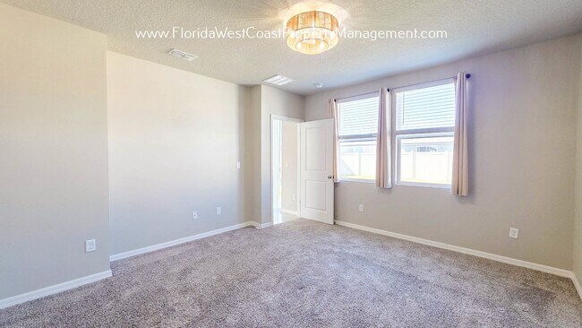 Building Photo - BRILLIANT and SPACIOUS! 4 BEDROOM/2.5 BATH PLUS LARGE BONUS-FLEX SPACE and FENCED YARD!