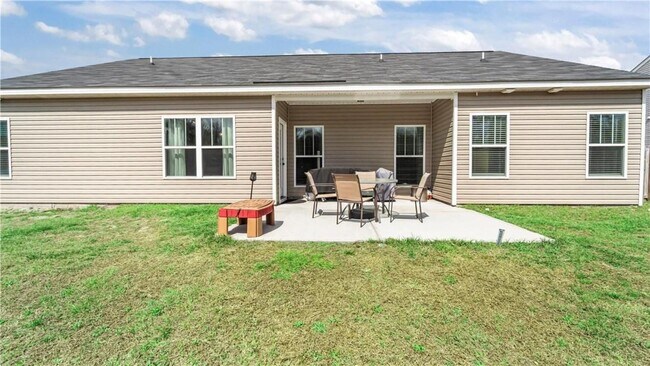 Building Photo - Relax & Unwind at this 4-Bedroom Home with Scenic Lagoon Views in Rincon