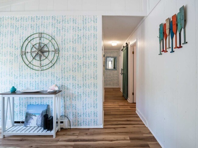Building Photo - OFF-SEASON MONTHLY BEACH LIVING AWAITS!