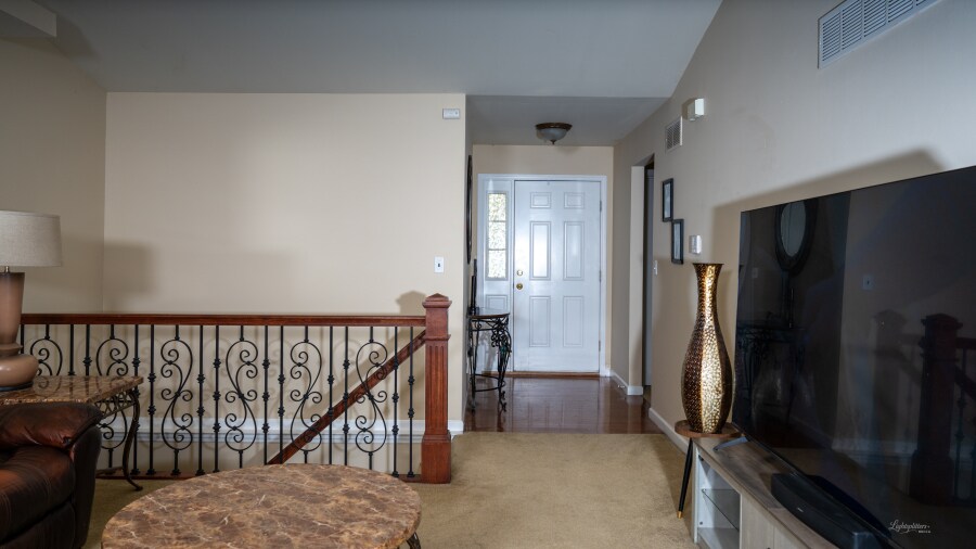 wood entry from front door - 615 Grayhawk Cir