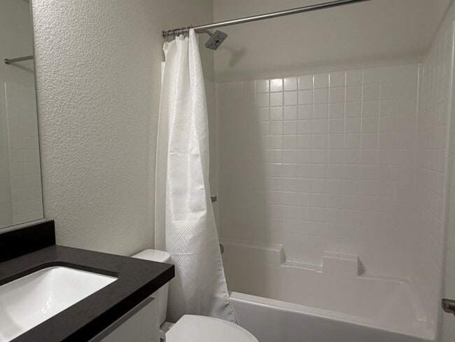 Building Photo - Loft home in downtown Woodland with SOLAR!!