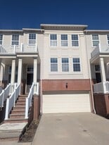 Front entrance with a two-car garage - 6465 Park Pointe Ct