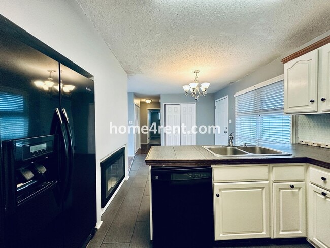 Building Photo - Charming Ranch Style, Prairie Village Home w/ a Fenced Yard, Updated Baths, and All Appliances In...