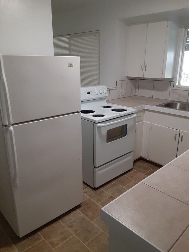 Building Photo - Triple J Properties-PM#025-0249-5015