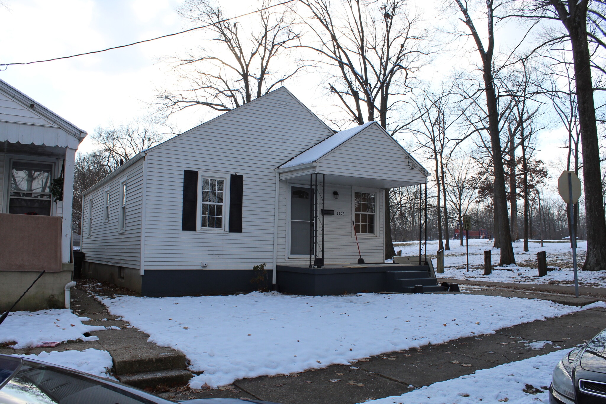 Fresh snow. New front door. Sealed and paint front porch. All new railing in the coming days!!! - 1395 Ross Ave