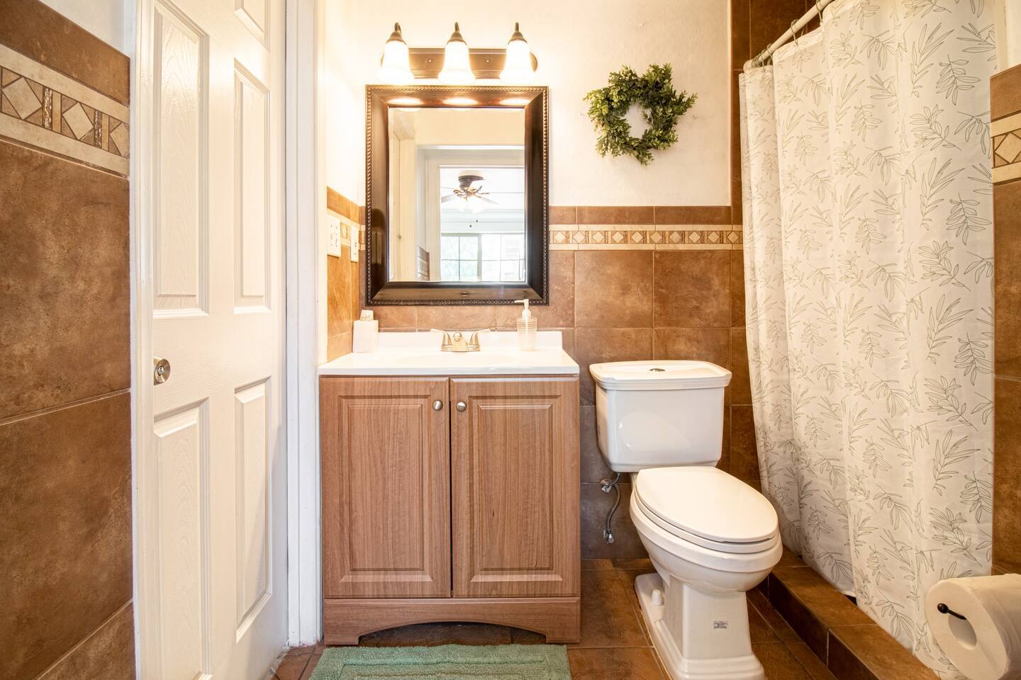 A full private bathroom. - 5901 W Cypress St