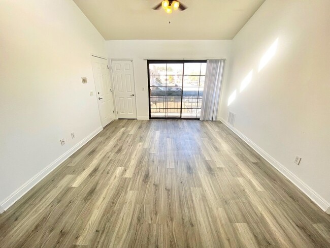 Building Photo - CONDOMINIUM IN A GATED COMMUNITY WITH 2 BE...