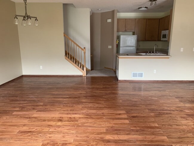 Building Photo - Beautiful 2 Bed/1.5 Bath townhome, with extra large open concept living space - Available Mar 1