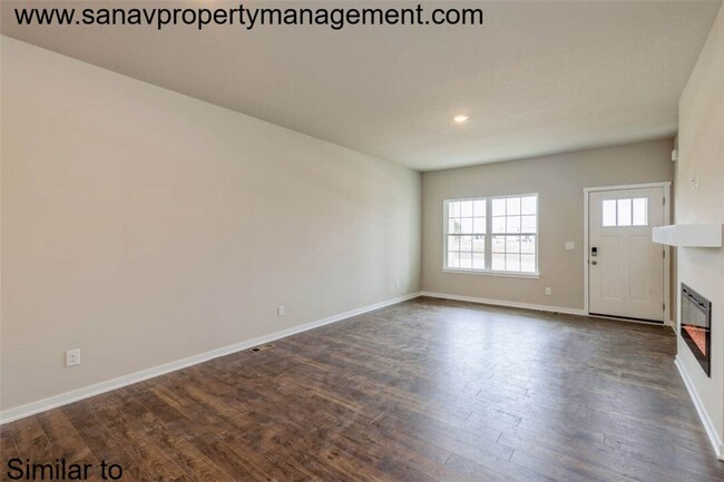 Building Photo - "Charming 2-Bedroom Home in Exclusive 36 W...
