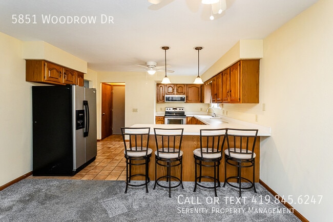 Building Photo - 5851 Woodrow Dr