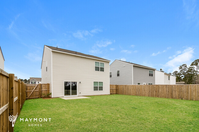 Building Photo - Inviting 4 Bedroom Home