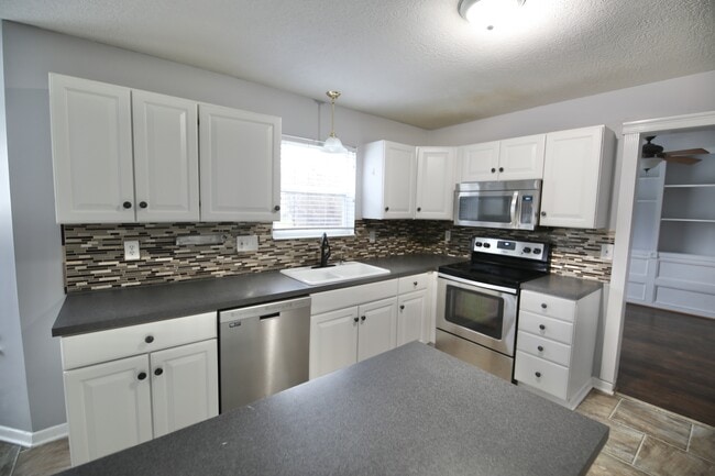 Building Photo - 4400 Greensbury Dr