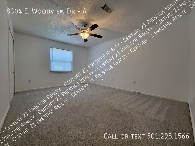 Building Photo - 8304 Woodview Dr N