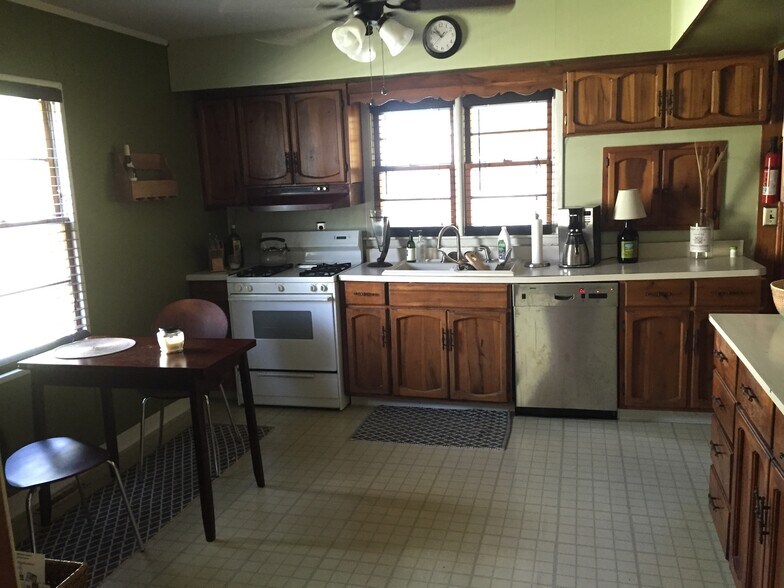 stove and range hood have been replaced with stainless steel - 213 E Vermilya Ave