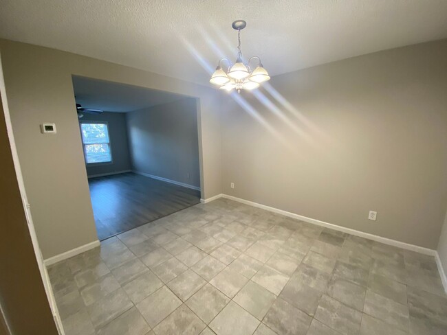 Building Photo - NEW PRICE - Updated Townhome Available for...