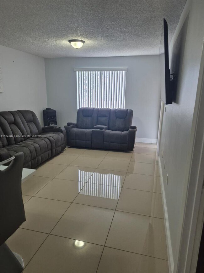 Building Photo - 7865 W 30th Ct