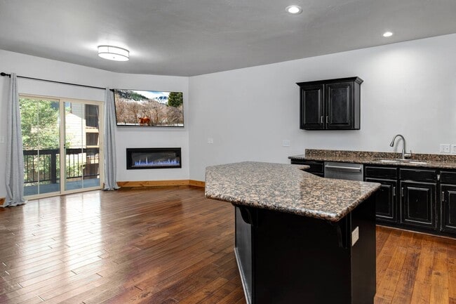 Building Photo - Unfurnished Condo Retreat with Modern Comf...