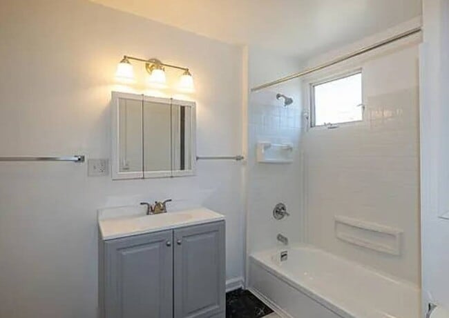 Building Photo - Newly Renovated 4BR/1BA Single-Family Home with Garage – Cleveland