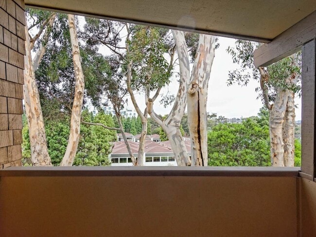 Building Photo - Water, Sewer, Trash Included! Fireplace, Washer, Dryer, 2 Assigned Parking, Garage, Open Floor Pl...