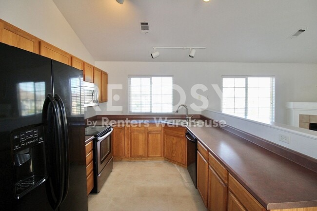 Building Photo - 3242 E 103rd Dr
