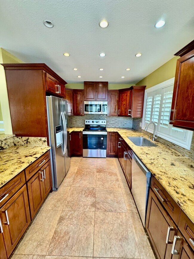 Building Photo - Available now | A 4 Bedroom, 2 Bathroom Si...