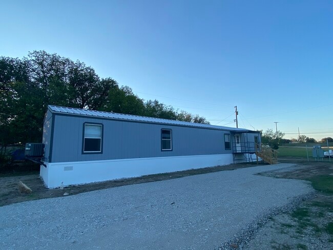 Building Photo - Early Bird Estates Unit #22