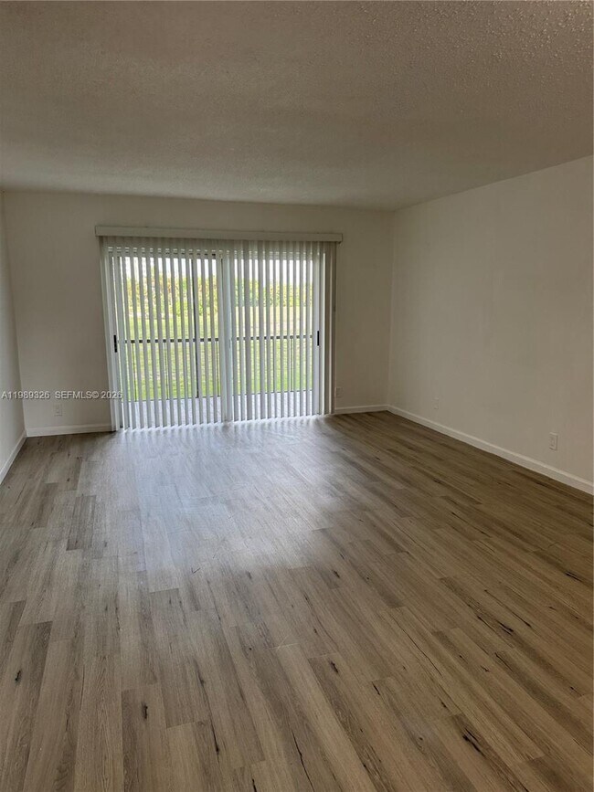 Building Photo - 6301 N Falls Cir Dr