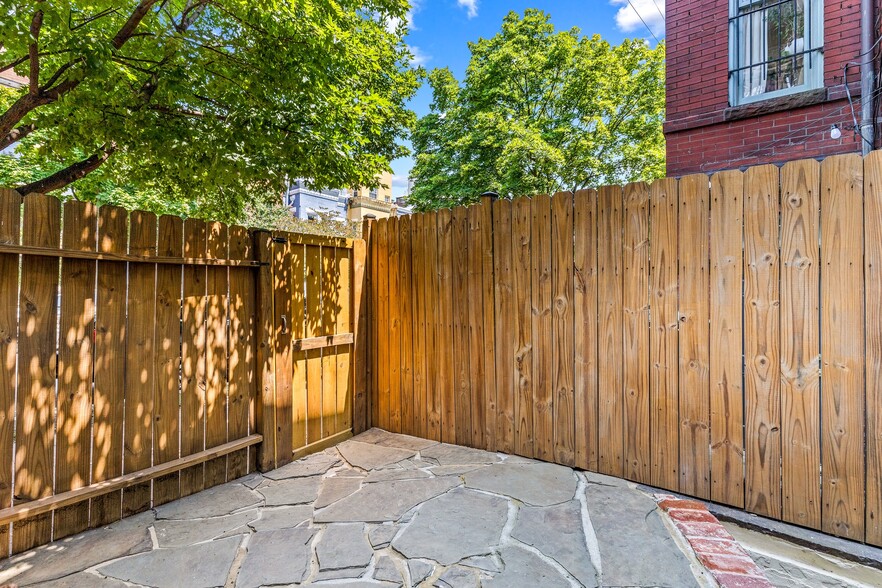 rear patio and gate to N St., NW - 39 New York Ave NW