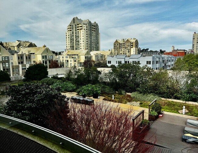 Building Photo - Corner Light. City Energy. Zero Compromise.