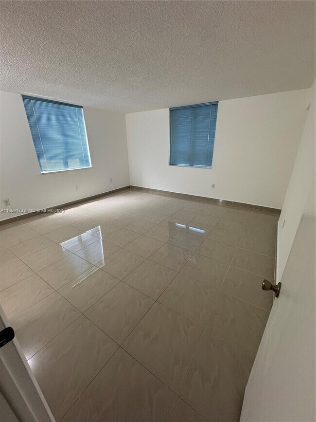 Building Photo - 6841 SW 147th Ave